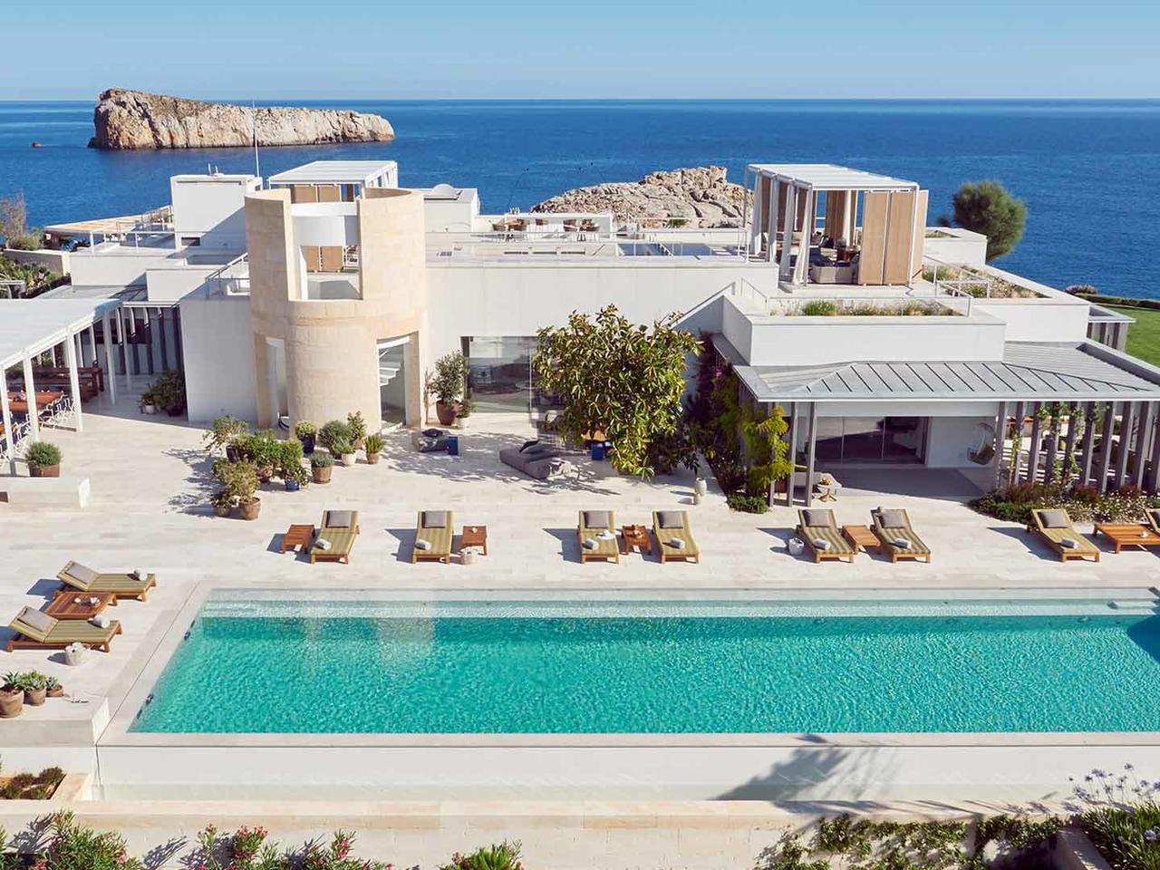 Modern villa with a pool and sea view.