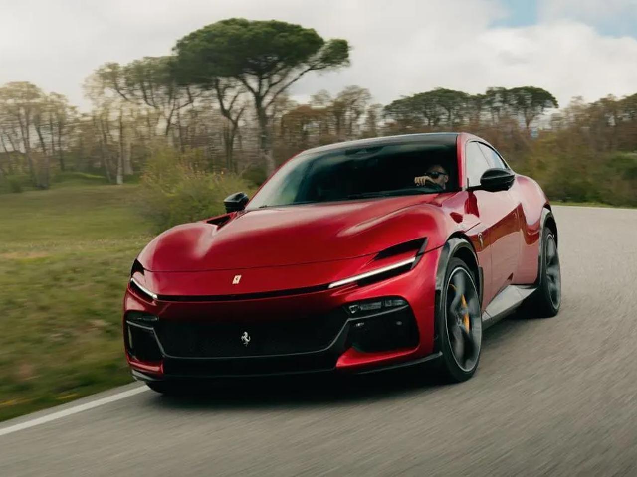 Red sports car on a road