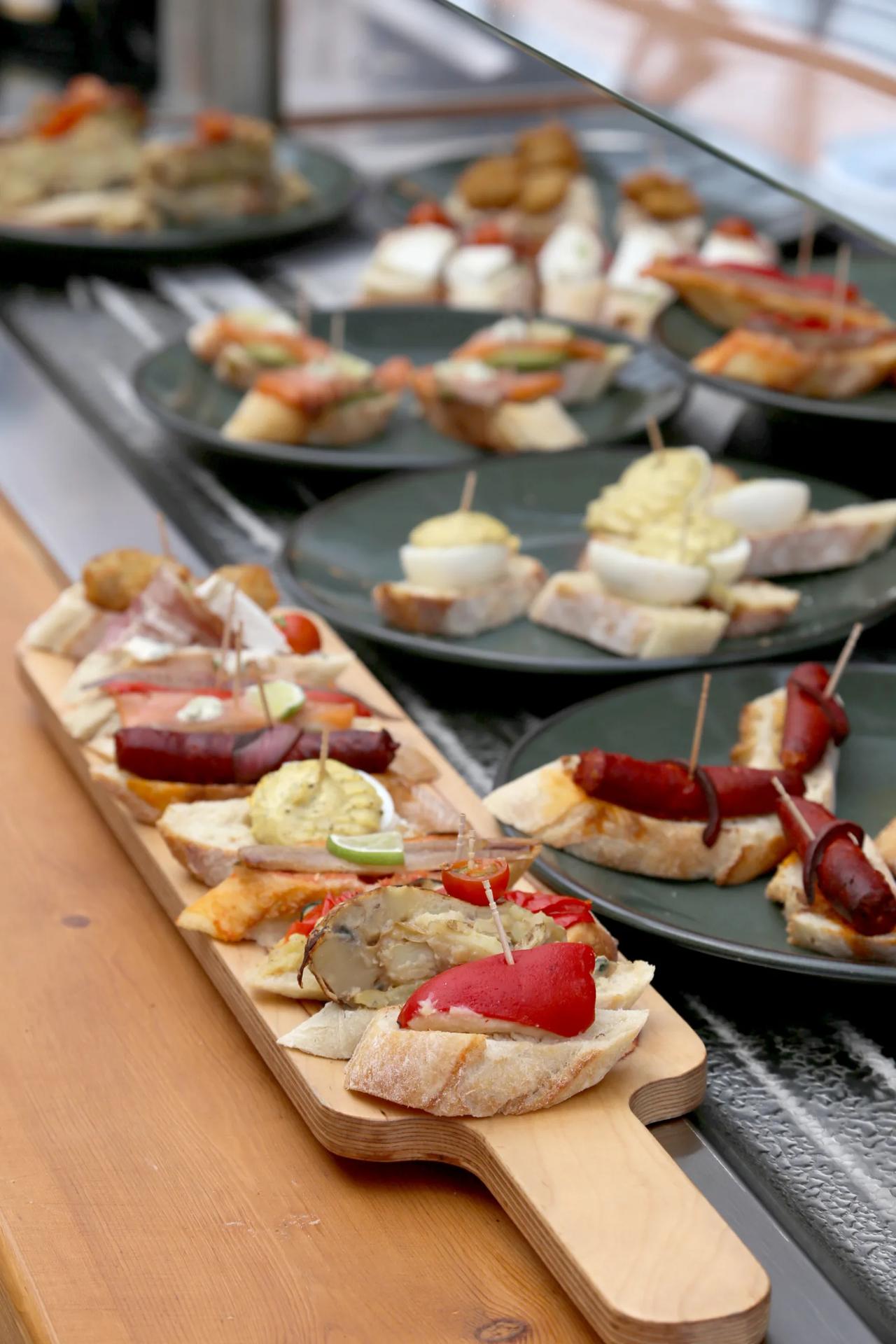 Platter of assorted tapas with various toppings