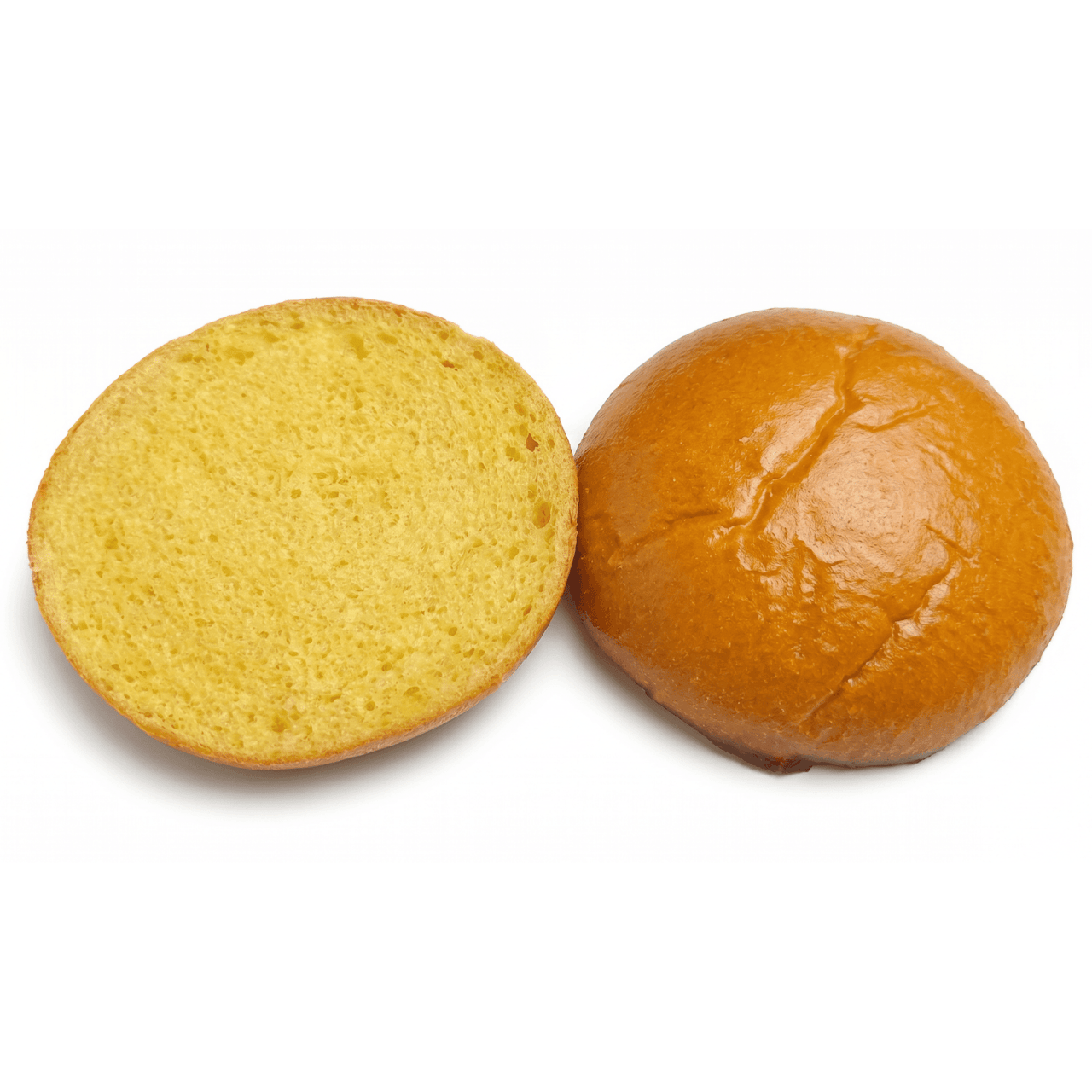 Round bread cut in half, featuring a golden crust and soft crumb.