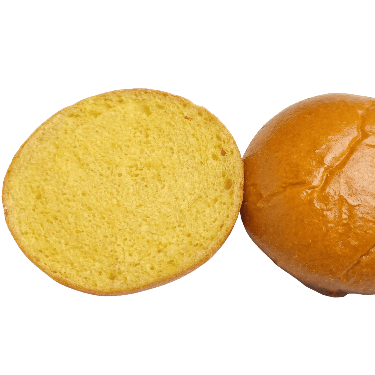 Pain rond coupé en deux, montrant l'intérieur moelleux.